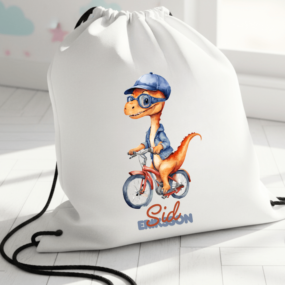 Personalisierter Turnbeutel – Dinosaurier auf dem Fahrrad – mit Namen
